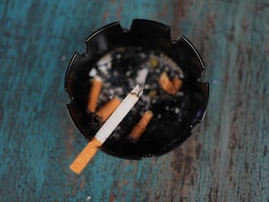 A cigarette in an ashtray