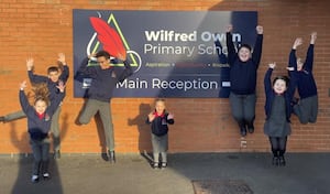 Pupils at Wilfred Owen Primary School celebrate. 