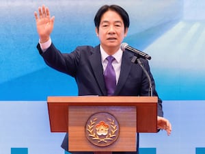 Taiwan’s President Lai Ching-te waves