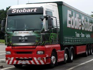 A green and red Eddie Stobart HGV