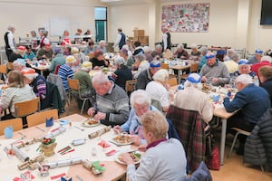 Senior citizens tucking into their dinners