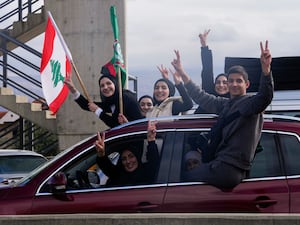 Displaced residents celebrate as they return to their villages following a ceasefire between Israel and Hezbollah