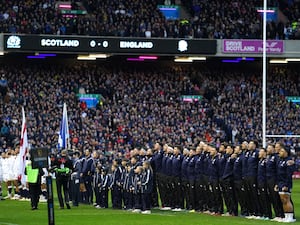 Scotland and England players line up ahead of the Guinness Six Nations match at Murrayfield in 2024