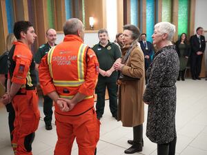 Anne speaks members of the critical care team at Southmead Hospital in Bristol during a visit to thank the medical team for their care