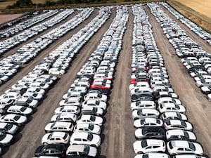 New cars lined up on a lot