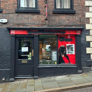 The office on Wyle Cop has been daubed with black paint.