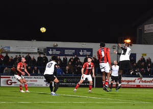 Orrin Pendley gets one back for the Bucks against Kettering (Pic: Mike Sheridan)