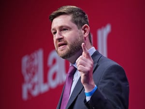 Jim McMahon points his finger during a speech at the Labour Party conference in 2021