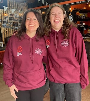 Natalie Davis, left, with her daughter Chloe, 26, who has supported her mum throughout her journey and will be walking with her