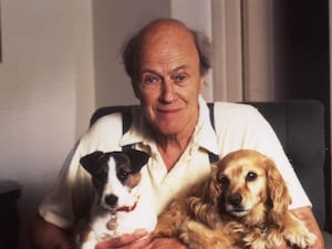 Roald Dahl with his dogs