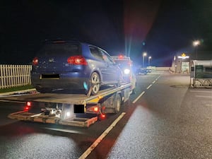 One man was arrested and police seized three cars in Oswestry. Picture: West Mercia Police/Simon Wilkey. 