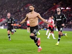 Mohamed Salah celebrates scoring Liverpool’s third goal