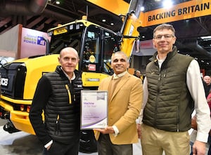 The Silver award for Machine of the Year was presented at the LAMMA show to (from left) Richard Brooks, Chief Innovation Director, Ajay Patil, Group Business Director, and John Smith, JCB Agriculture Managing Director.