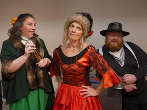 Belle played by Fiona Collins in the centre with Connie and Billy the Skid. Image: Andy Compton