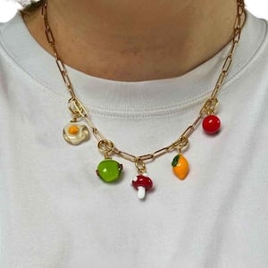 The ever popular Murano Glass Deli Charm Necklace