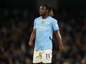 Manchester City’s Jeremy Doku standing on the pitch during the Premier League match against Nottingham Forest at the Etihad Stadium