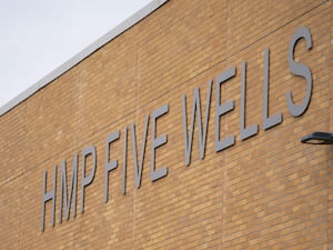 General view of HMP Five Wells signage on a wall