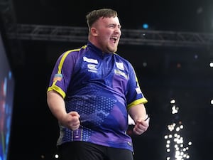 Luke Littler celebrates victory in the final against Luke Humphries during the 2024 Premier League play-off