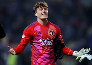 Queen's Park goalkeeper Calum Ferrie celebrates their victory following the Scottish Gas Men's Scottish Cup fifth round match at Ibrox