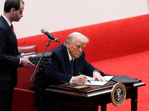 US President Donald Trump signs an executive order