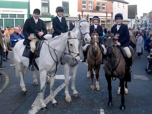 Hunt members enjoying a drink before setting off to follow the false trail.