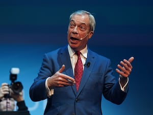 Reform UK leader Nigel Farage speaking during the Reform UK East Midlands Conference on Friday