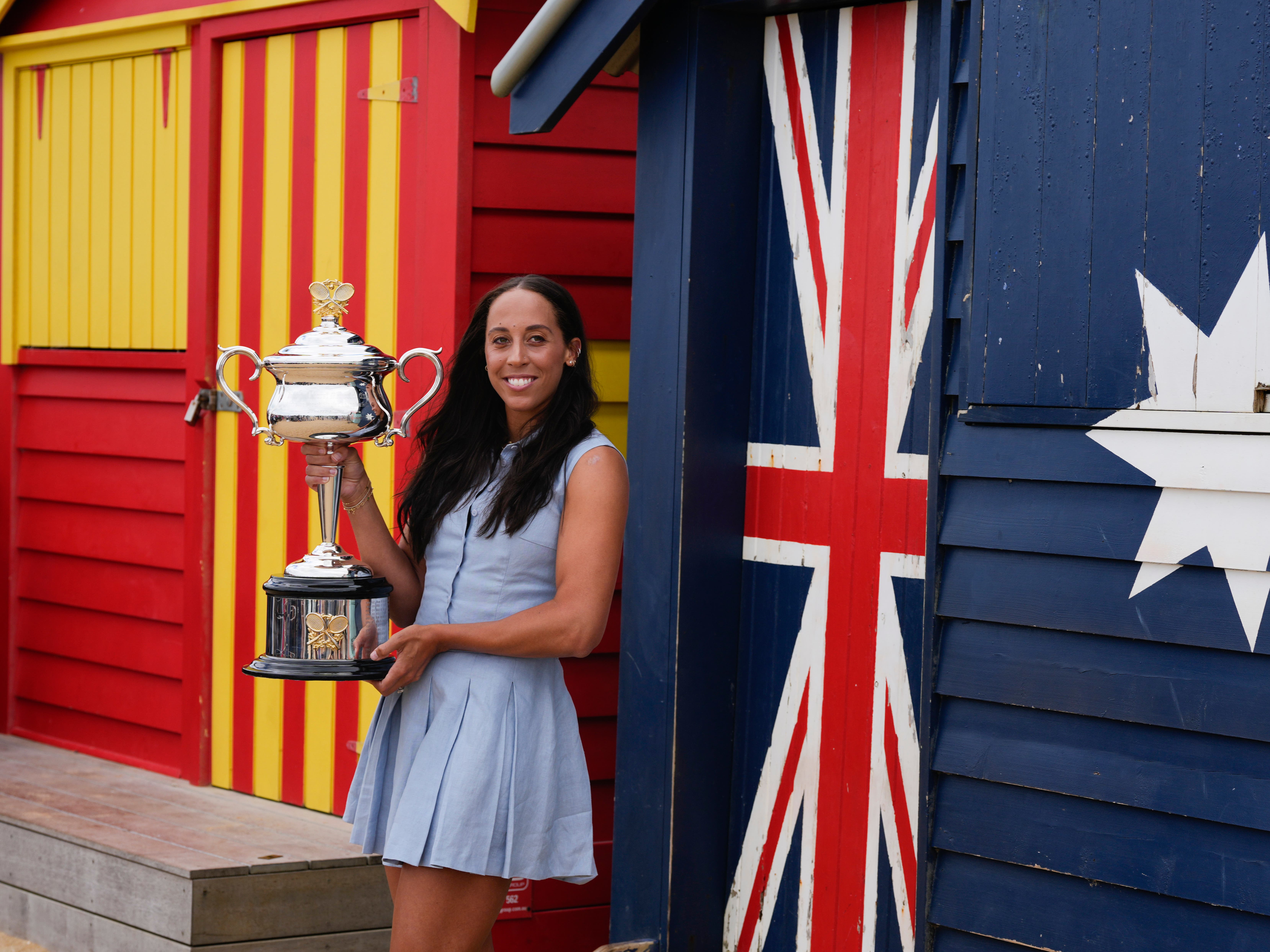 Madison Keys holds the Daphne Akhurst Memorial Cup at the Brighton Beach Boxes in Melbourne