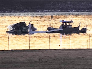 Rescue craft near crash wreckage on the Potomac river