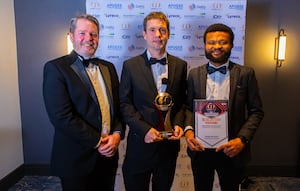 Wayne Welsby, Grant Thomas and Christian Ikechi Obua from the council’s Procurement and Commercial Services collecting the Best Net Zero Initiative award.