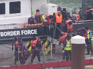 A group of people thought to be migrants are brought in to Dover, Kent, from a Border Force vessel following a small boat incident in the Channel