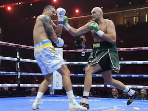 Tyson Fury (right) and Oleksandr Usyk in the ring