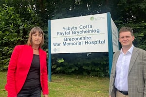 Mid and West Wales Senedd Member Jane Dodds and Brecon, Radnor and Cwm Tawe MP David Chadwick in front of Brecon Hospital