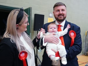 Labour's Chris Webb with his wife and baby son