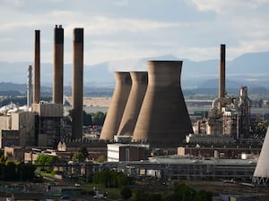 Exterior view of Grangemouth refinery, with several large chimneys visible