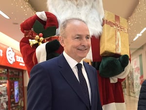 Fianna Fail leader Micheal Martin canvassing at Bridgewater Shopping Centre (PA)