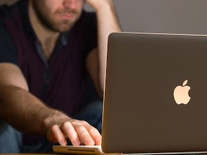 A man using a laptop