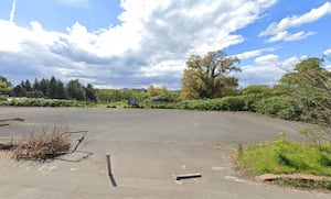 The car park and field that could host 21 new homes. Photo: Google