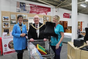 Mayoress Sara Peters, Mayor Councillor Frank James and Kat Pearce from Hospice at Home