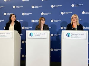 Deputy First Minister Emma Little Pengelly, Finance Minister Caoimhe Archibald, and First Minister Michelle O'Neill during a press conference