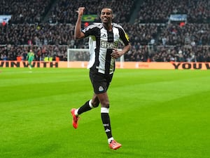 Newcastle's Alexander Isak celebrates his first goal against Wolves