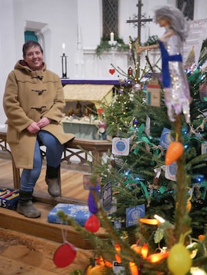 Reverend Rachael Storer at the Christmas tree festival in New Radnor Church.Image: Andy Compton