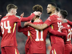 Cody Gakpo, centre right, celebrates scoring Liverpool's first goal