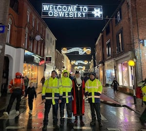 Mayor of Oswestry Cllr Mike Isherwood with council staff Paul, Paul and Charlie helping at Friday’s Christmas Live event.