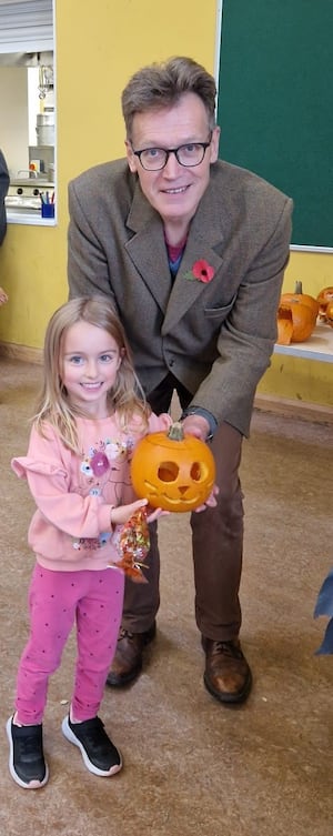 Runner-up of the child pumpkin carving was Evie Richardson, here with Cllr Berriman