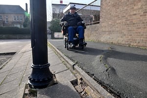 Barry Salter on the footpath next to Queen Street Car Park. 