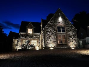 The house lit up at night. Picture: Rightmove and Peter James Property Ltd.