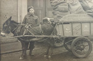 Jessie the donkey and Private 'Taffy' Ellis delivering the Christmas post in Shrewsbury in 1941