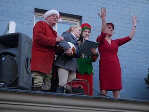 Robert Jones, senior joint master of the Radnor and West Herefordshire Hunt with Emilia Jaques and Dominika Hudcova, who sang ‘Merry Christmas Everyone’ with Burton Hotel owner Jana Hyde