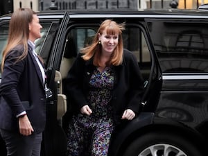 Angela Rayner getting out of a black car