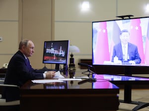 Vladimir Putin speaks with Xi Jinping via video conference (Gavriil Grigorov, Sputnik, Kremlin Pool Photo via AP)